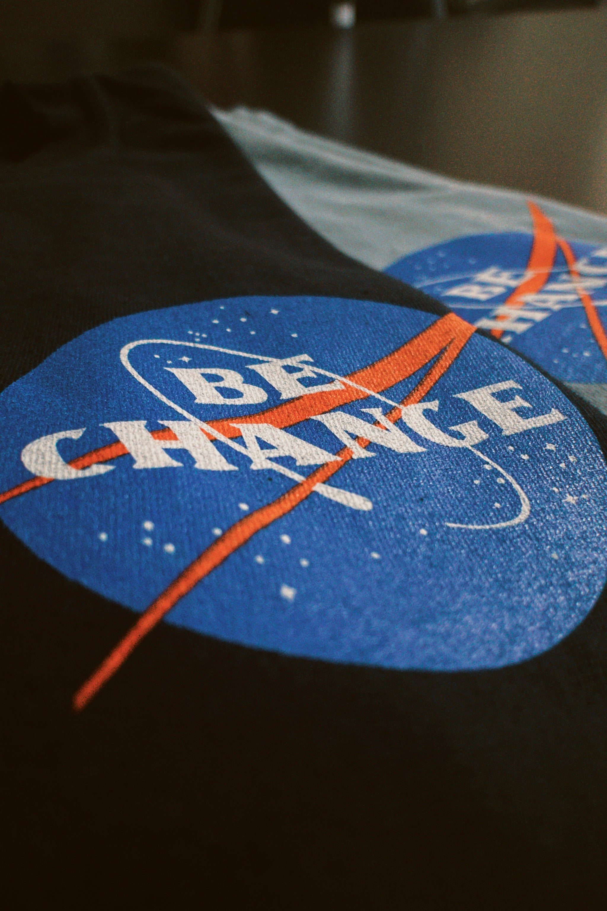 Be Change Logo Close Up Aeronautics & Space Tee